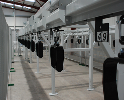Conveyor and hangers